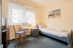 Postel nebo postele na pokoji v ubytování Hotel Dori´s 108