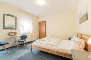 Postel nebo postele na pokoji v ubytování Hotel Dori´s 108