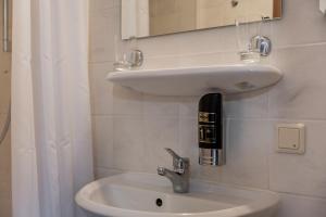 Koupelna v ubytování Hotel Dori´s 108