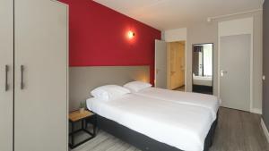 Krevet ili kreveti u jedinici u okviru objekta Golden Tulip Zoetermeer - Den Haag