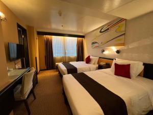 En TV eller et underholdningssystem på Best Western Plus Tsim Sha Tsui