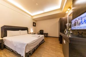 TV a/nebo společenská místnost v ubytování I HI Sanduo Travel Hotel