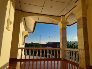 a view from the balcony of a house at Saphaothong guesthouse in Vang Vieng