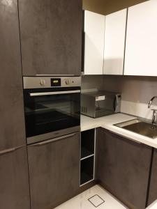 Dapur atau dapur kecil di Terminal Inn Al Mansoura