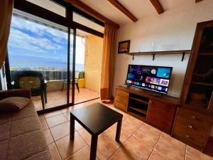 A television and/or entertainment centre at Sand and Salt Playa de Arena