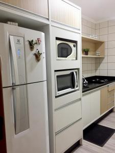 A cozinha ou cozinha compacta de Férias na charmosa Balneário
