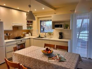 Kuchyňa alebo kuchynka v ubytovaní Apartmány Friends Tatry