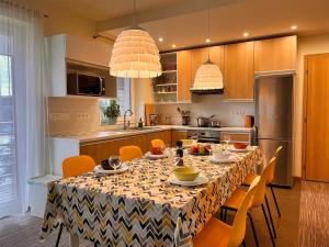 Kuchyňa alebo kuchynka v ubytovaní Apartmány Friends Tatry