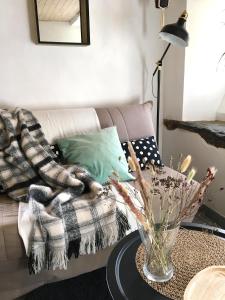 Posezení v ubytování Gîte "Prêt à dormir" dans une grange à Marsous