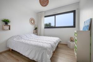 Posteľ alebo postele v izbe v ubytovaní Maison d’Architecte Face Mer à la Plaine sur Mer