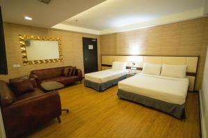 Postel nebo postele na pokoji v ubytování Citrus Hotel Johor Bahru by Compass Hospitality