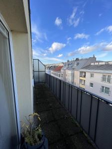 an apartment balcony with a view of buildings at Loge Sollinger1190 in Vienna