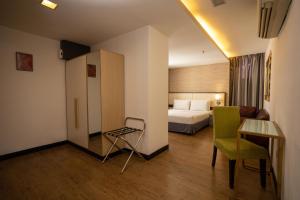 Postel nebo postele na pokoji v ubytování Citrus Hotel Johor Bahru by Compass Hospitality