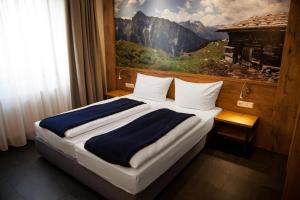 Cama ou camas em um quarto em Paulaner am Dom Hotel