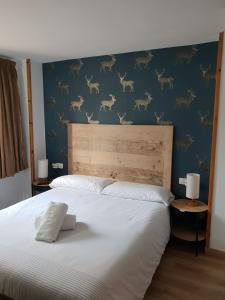 Postel nebo postele na pokoji v ubytování Mandilar Confort Panticosa