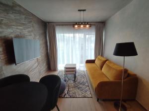 Posedenie v ubytovaní Apartament 413 Biała Perła