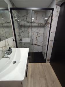 Kúpeľňa v ubytovaní Apartament 413 Biała Perła