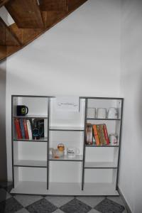 a refrigerator with its door open in a room at Ferienwohnung Happynest in Birresborn