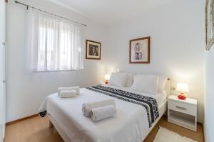 Ένα ή περισσότερα κρεβάτια σε δωμάτιο στο Apartman Vesna Uvala Makarac Milna
