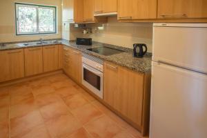 Una cocina o zona de cocina en AP Victoria Sports & Beach