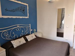 A bed or beds in a room at B&B Il Conservatorio