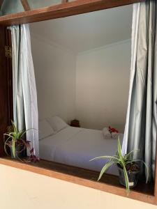 Postel nebo postele na pokoji v ubytování Casa Tropical Arraial D' Ajuda