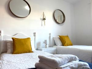 Posteľ alebo postele v izbe v ubytovaní Apartamento Natalia