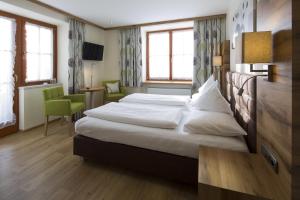 Krevet ili kreveti u jedinici u okviru objekta Hotel Gasthof Obermair