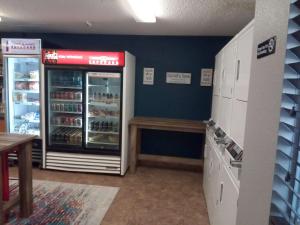 a store with a refrigerator and a table in it at Sonesta Simply Suites Somerset in Somerset
