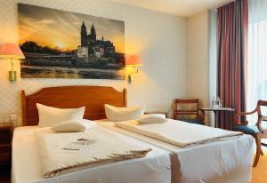 Postel nebo postele na pokoji v ubytování Mercure Hotel Plaza Magdeburg + 37 fotografií