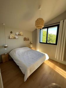Posteľ alebo postele v izbe v ubytovaní Villa des Mattes - Superbe maison de famille 15 couchages