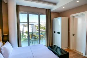 Postel nebo postele na pokoji v ubytování Hotel Luxury + 36 fotografií