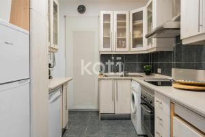 Kuchnia lub aneks kuchenny w obiekcie Koti Rentals - Albatros