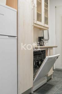 Kuchnia lub aneks kuchenny w obiekcie Koti Rentals - Albatros