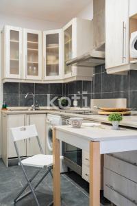 Kuchnia lub aneks kuchenny w obiekcie Koti Rentals - Albatros