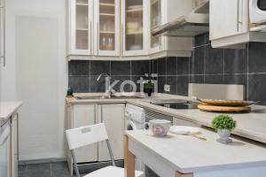 Kuchnia lub aneks kuchenny w obiekcie Koti Rentals - Albatros