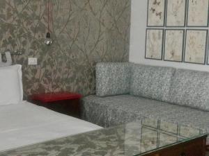 Postel nebo postele na pokoji v ubytování Ca' Monteggia Guest House