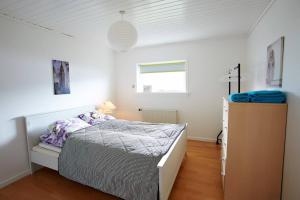 Ein Bett oder Betten in einem Zimmer der Unterkunft Liljulon - Views - Location