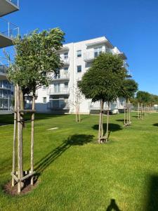 Vonkajšia záhrada v ubytovaní Seaside Apartamenty Porta Mare I Kołobrzeg