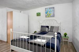 Postel nebo postele na pokoji v ubytování Ca' Navarro