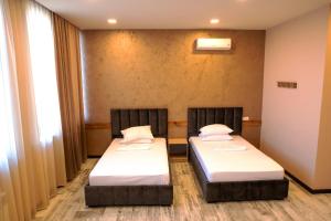 Letto o letti in una camera di B H Y Guesthouse in Yerevan