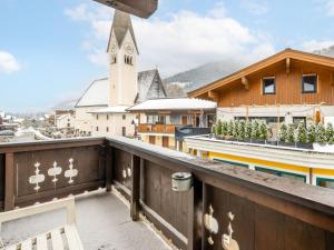 a view from the balcony of a church with a clock tower at Apartment Vorreiter - UTD151 by Interhome in Uttendorf