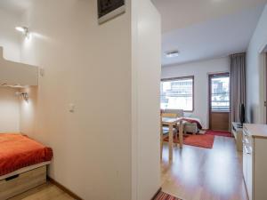 Μια τηλεόραση ή/και κέντρο ψυχαγωγίας στο Holiday Home Nordic chalet 9211 by Interhome +6 φωτογραφίες