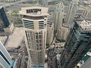an aerial view of a tall building in a city at Torch 77 in Dubai