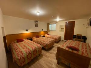Rúm í herbergi á Saphi Inn Cusco - Excelente ubicación