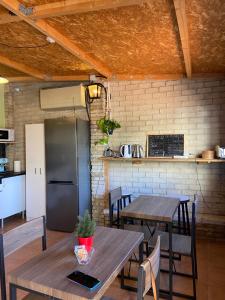 Kuchyň nebo kuchyňský kout v ubytování Hostal Orange Vibes