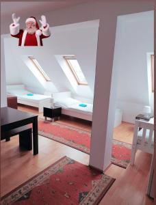 a living room with santa claus on the ceiling at Favoriten-Rooms in Vienna