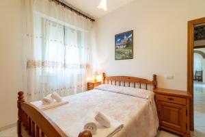 Posteľ alebo postele v izbe v ubytovaní Papà Giuseppe La Colombaia + 24 fotografií