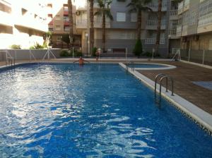 Bazén v ubytování EXCEPTIONNEL APPARTEMENT EN ESPAGNE nebo v jeho okolí