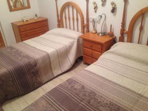 Postel nebo postele na pokoji v ubytování EXCEPTIONNEL APPARTEMENT EN ESPAGNE